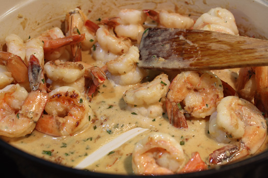 The final step - add the shrimp back to the pan.