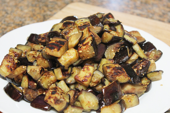 Eggplant is fried until soft and caramelized